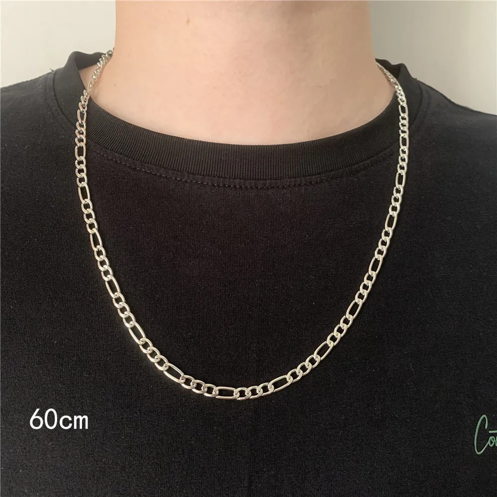 Men's simple electroplated alloy necklace in gold on a grey background