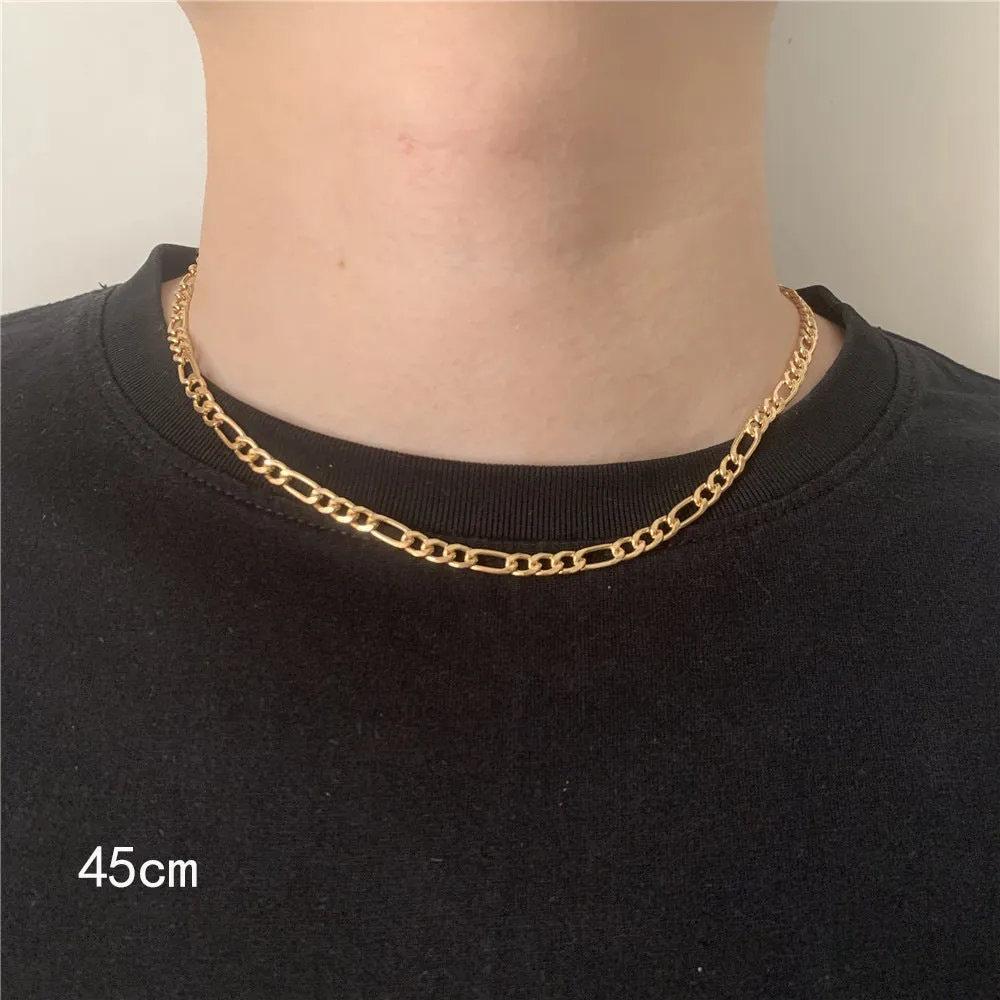 Men's simple electroplated alloy necklace in gold on a grey background