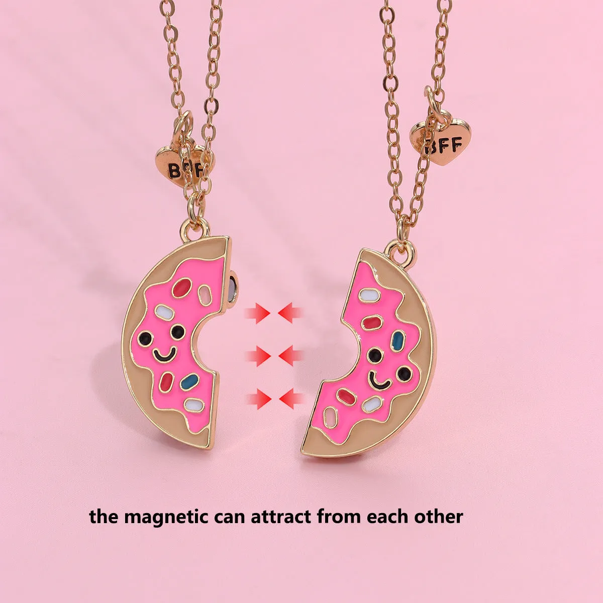 Two matching zinc alloy pendants in donut and watermelon shapes with glossy oil drip finish on cross chains