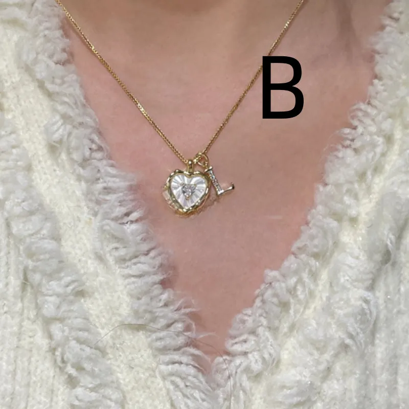 Mixed material pendant necklace for women, heart shaped and geometric designs, regular chain, colour options A-M.