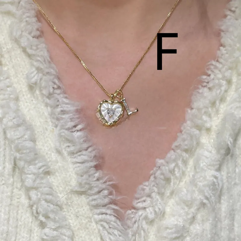 Mixed material pendant necklace for women, heart shaped and geometric designs, regular chain, colour options A-M.