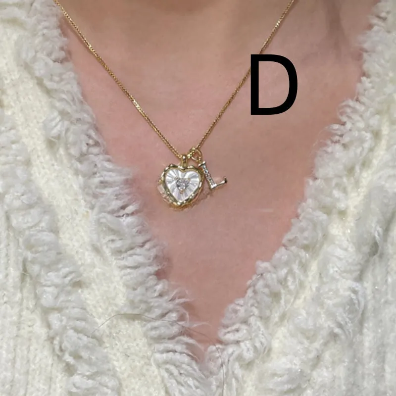Mixed material pendant necklace for women, heart shaped and geometric designs, regular chain, colour options A-M.