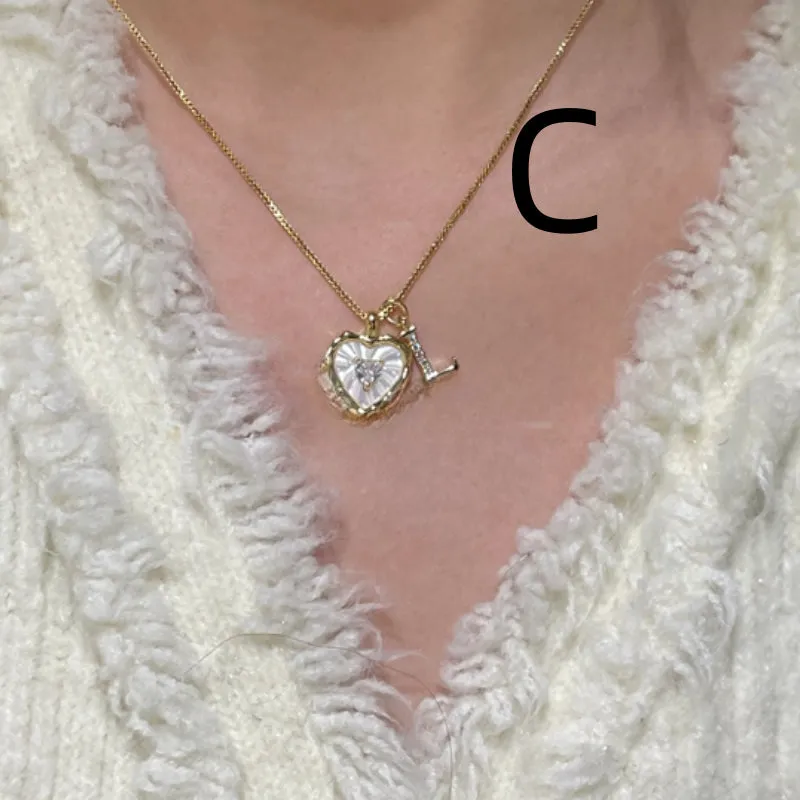 Mixed material pendant necklace for women, heart shaped and geometric designs, regular chain, colour options A-M.