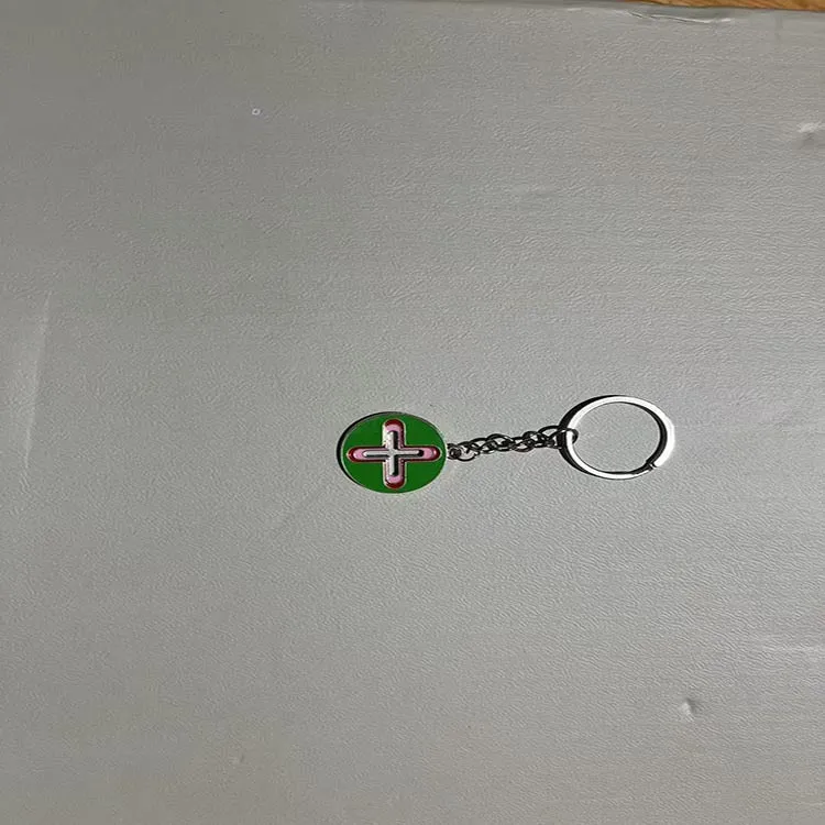 Colourful pendant keychain made of zinc alloy in eight colour options including black, blue, green, pink, purple, red, sky blue, yellow.