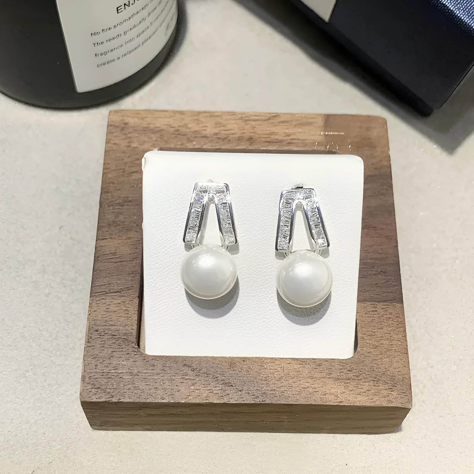 Set of three French retro minimalist faux pearl clip-on earrings in gold and silver tones