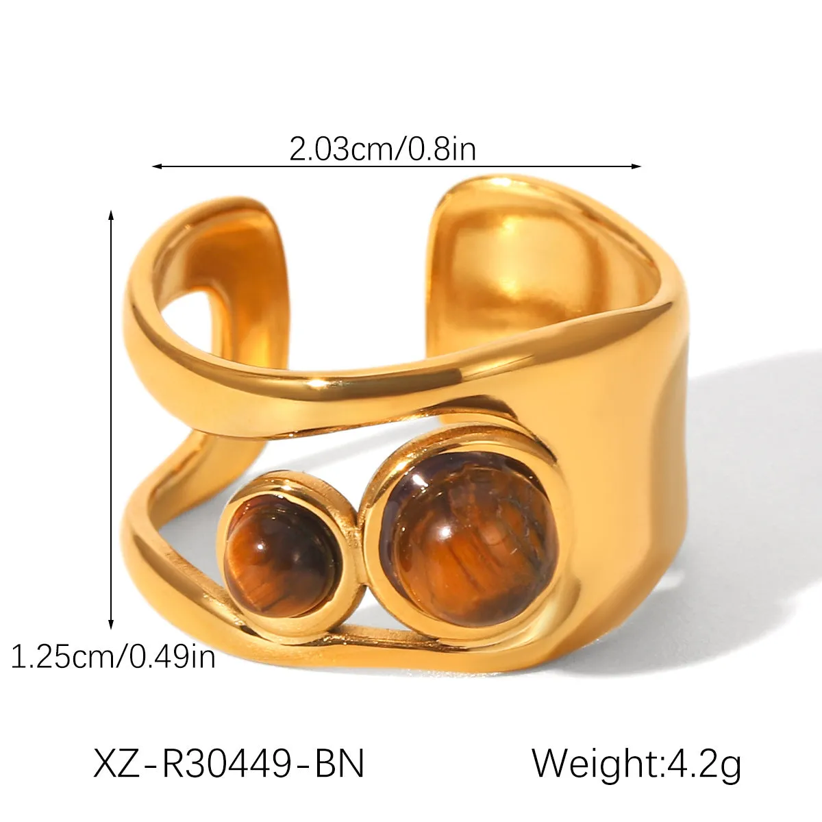 Stainless steel wide face bracelet inlaid with natural tiger eye stone on a neutral background