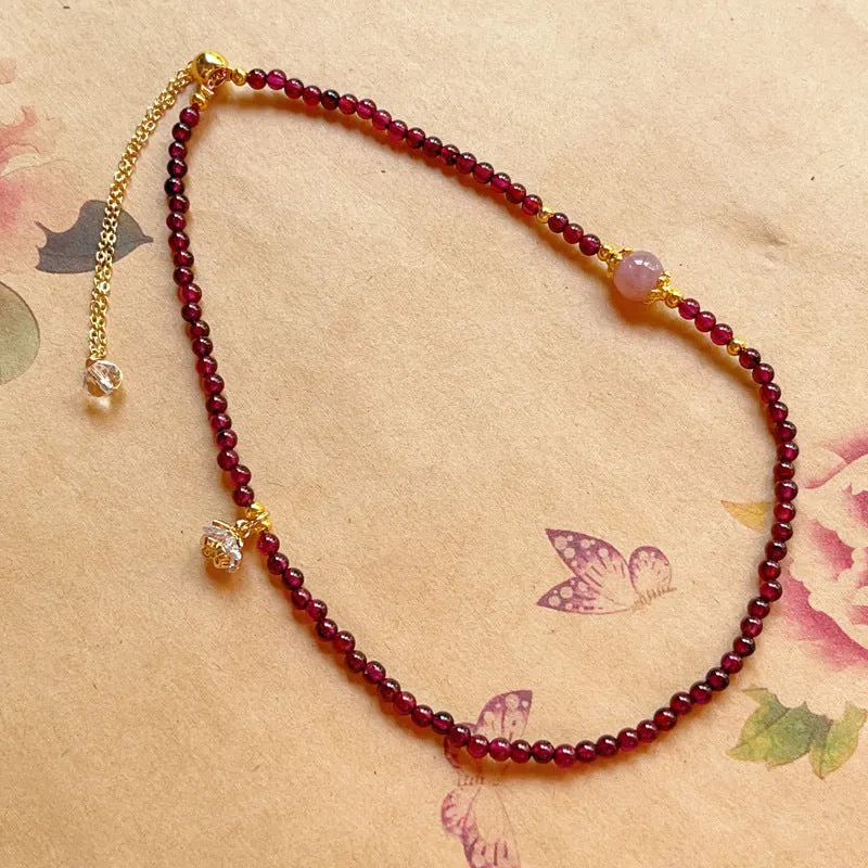 Women's natural garnet bracelet with double ring design and H311 colour garnet