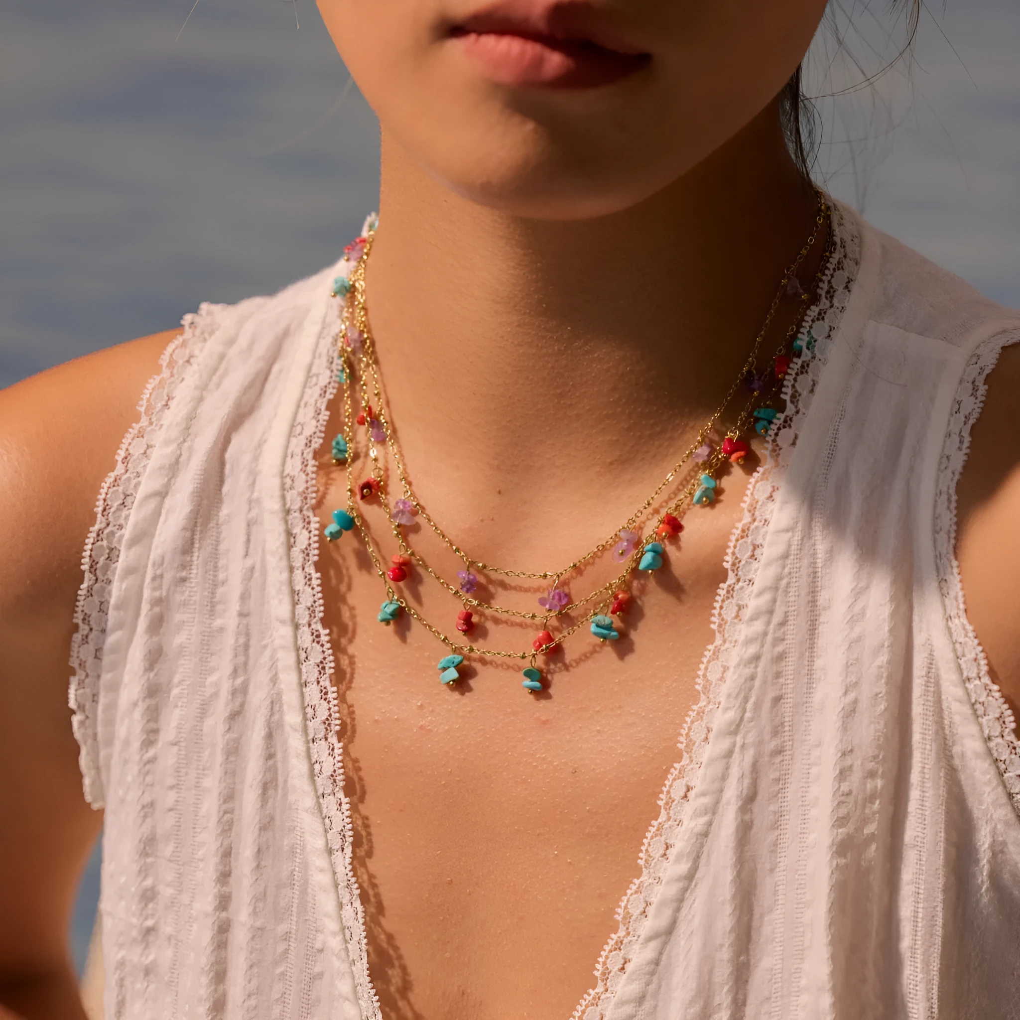 Natural stone necklace with stainless steel chain and 18K gold plating, available in amethyst