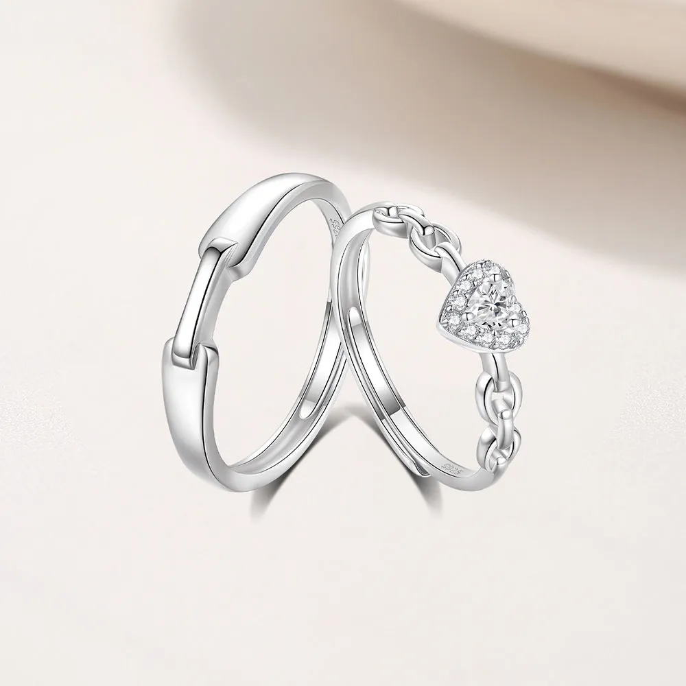 925 silver couple ring with diamond detail and adjustable opening, geometric shape with heart and chain motifs