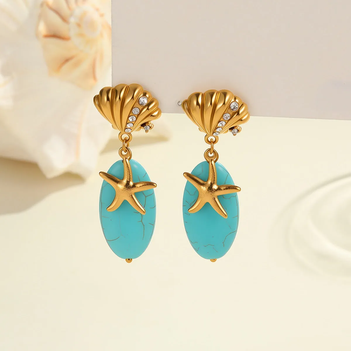 Natural turquoise stone earrings in stainless steel with 18K electroplated gold-tone geometric star shape