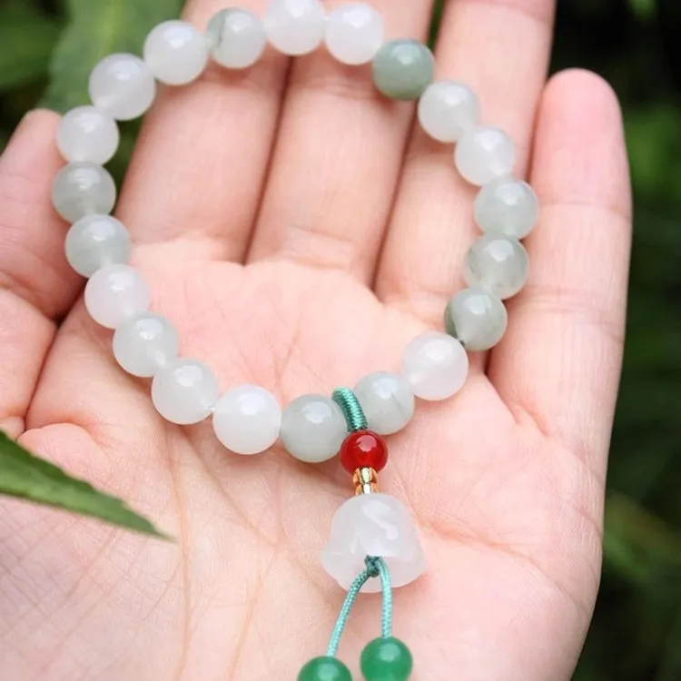 Hand-woven agate bracelet with white round beads, lotus seedpod beads, and Tianshan Cui elements in Chinese style