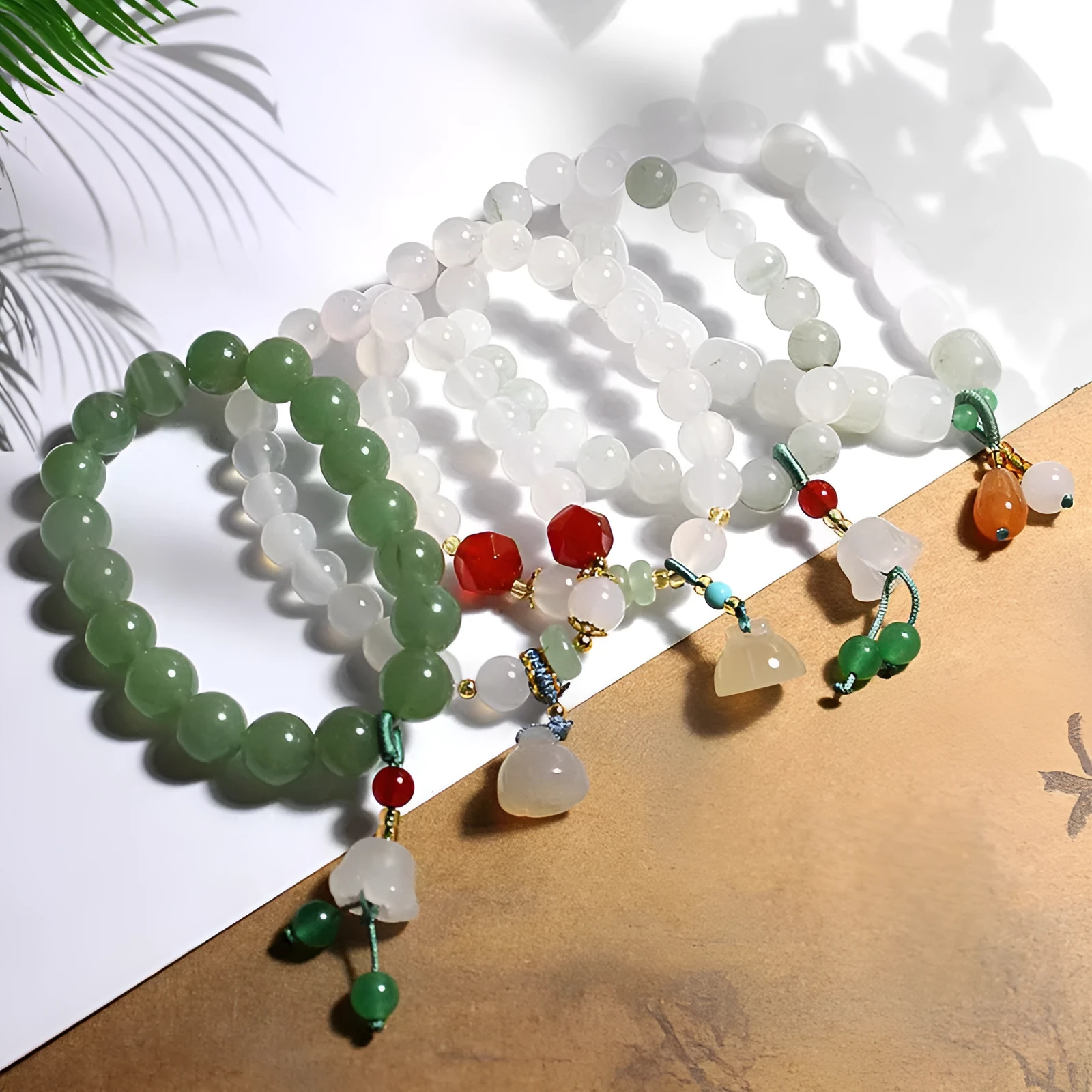 Hand-woven agate bracelet with white round beads, lotus seedpod beads, and Tianshan Cui elements in Chinese style