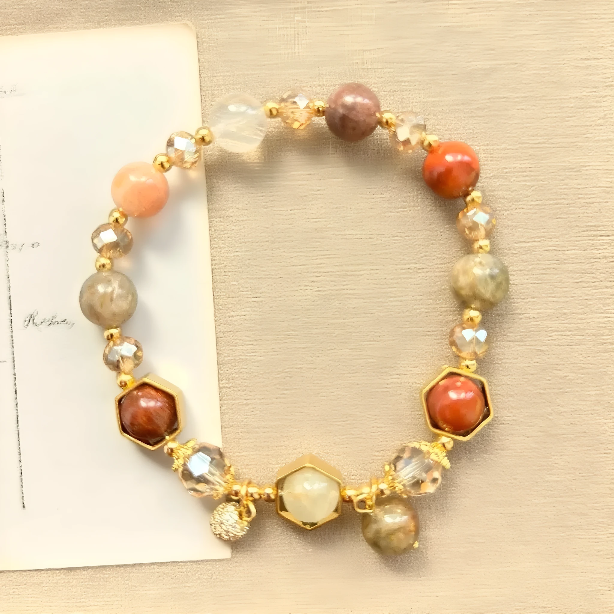 Gold-coloured hand-woven citrine bracelet with auspicious symbols and 8mm beads.