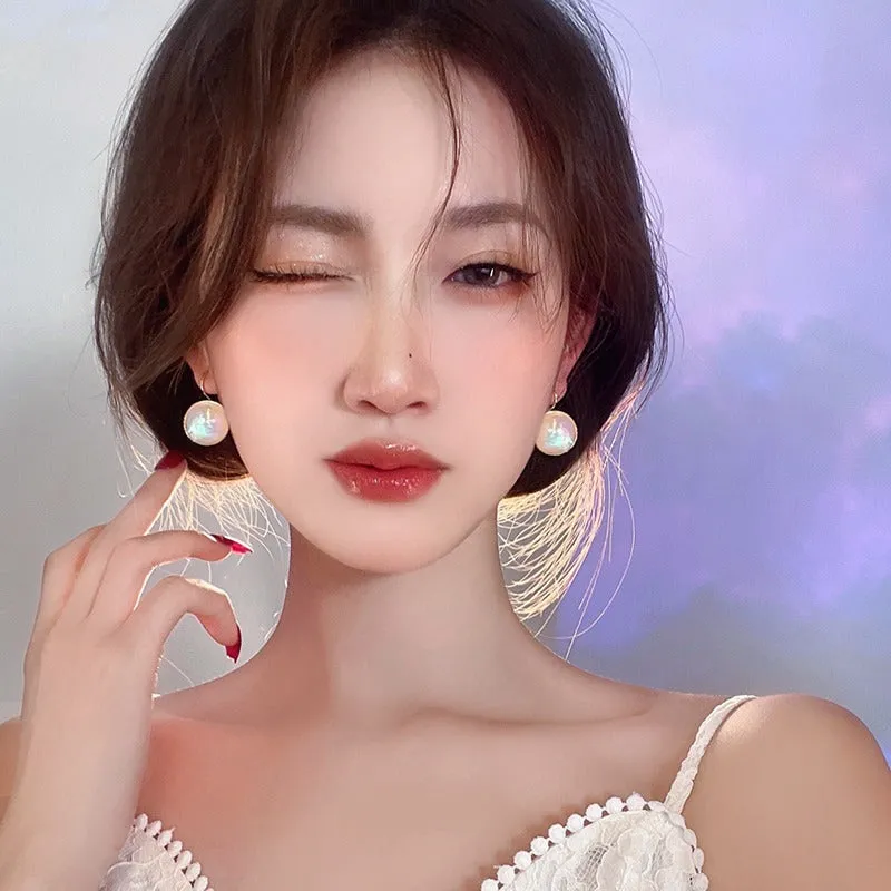 Geometric round mermaid pearl ear clips with colourful electroplated finish and anti-lost design
