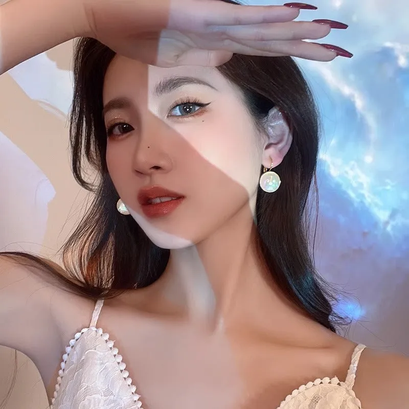 Geometric round mermaid pearl ear clips with colourful electroplated finish and anti-lost design