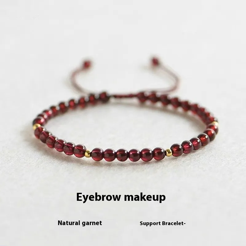 Hand-woven garnet red bracelet with flexible wire rope construction and Chinese national tide design