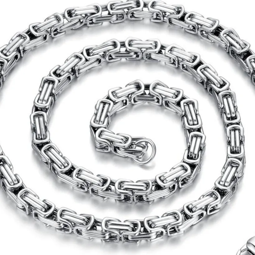 Stainless steel punk necklace with 5mm chain in steel finish on black background