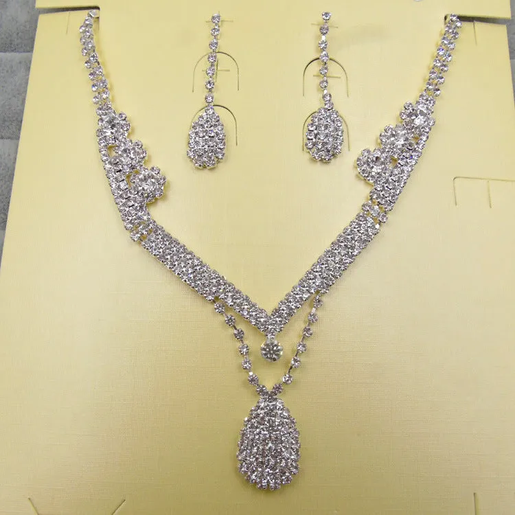 Water drop rhinestone bridal necklace and earrings set on silver tone base for weddings and formal events