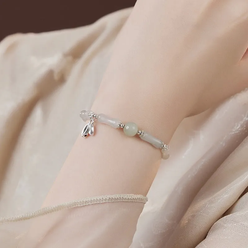 Women's antique style bracelet made from Tianshan green bamboo and sterling silver with bamboo joint detailing