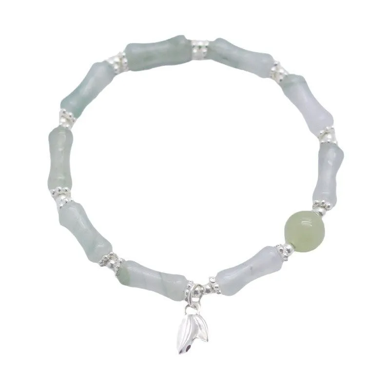 Women's antique style bracelet made from Tianshan green bamboo and sterling silver with bamboo joint detailing