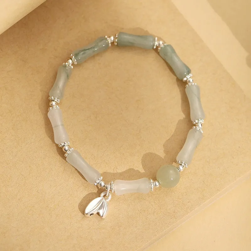Women's antique style bracelet made from Tianshan green bamboo and sterling silver with bamboo joint detailing
