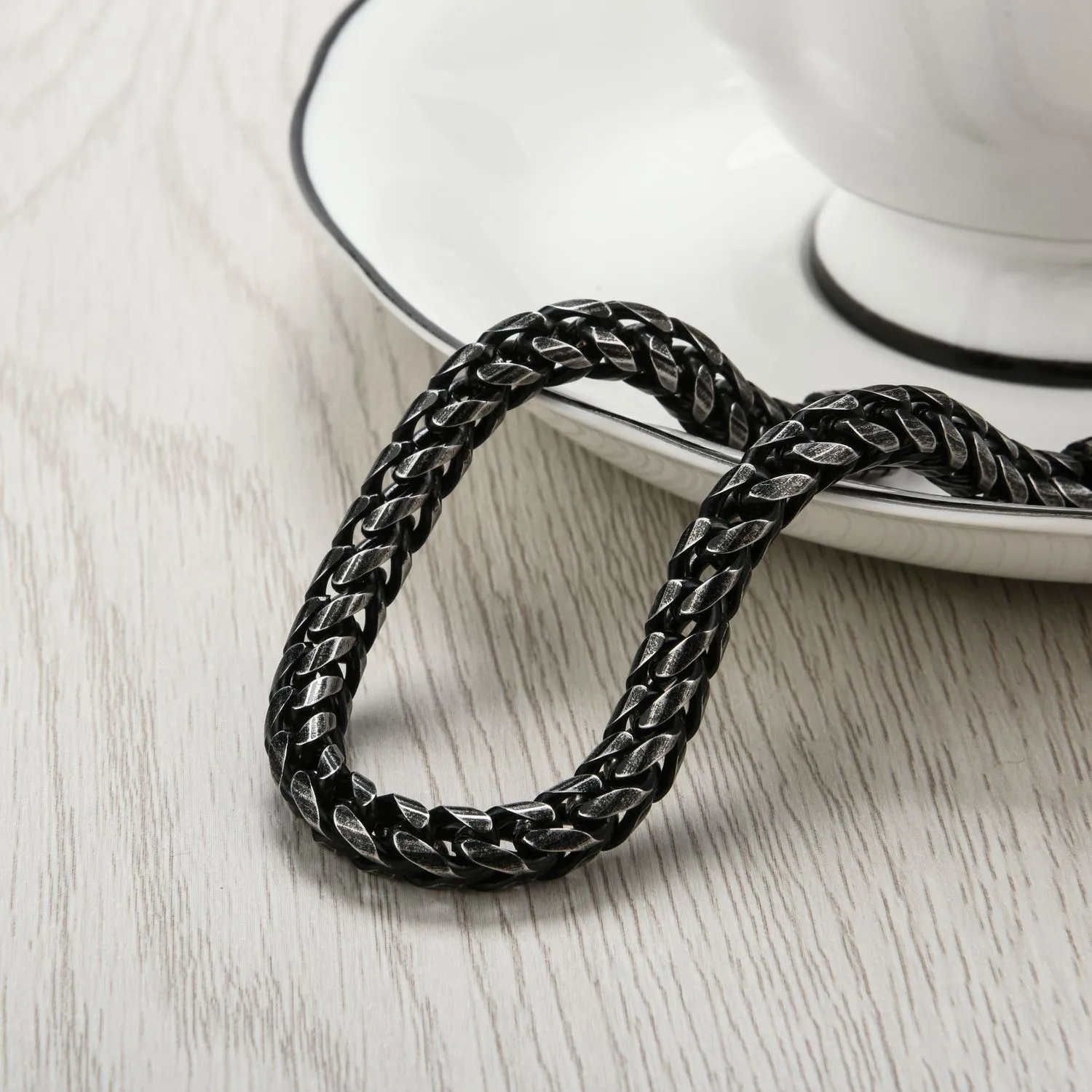 Custom stainless steel vintage mens bracelet with retro colour finish, 22.3 cm length, 30 g weight, on neutral background