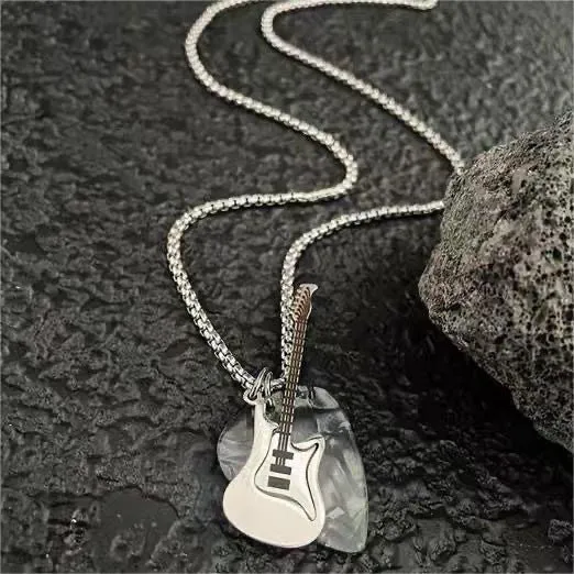 Black guitar pendant necklace in titanium steel on box chain, lithographic finish, women's punk rock style accessory.