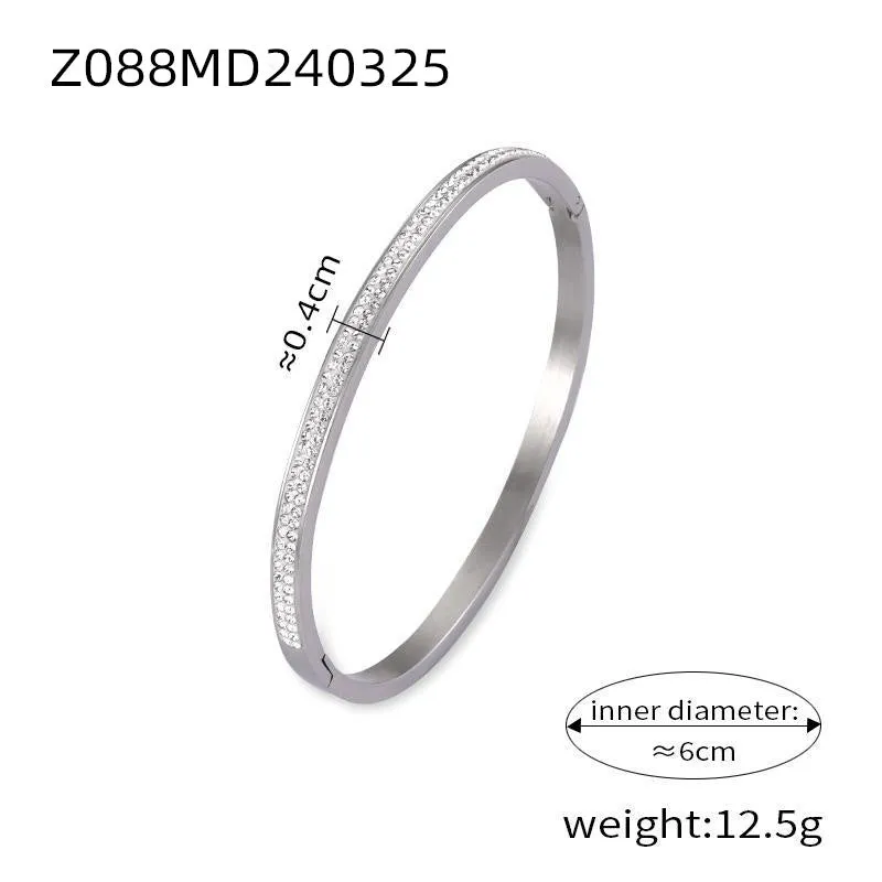Retro Roman numeral titanium steel gold-plated bracelet with diamond accents on wrist