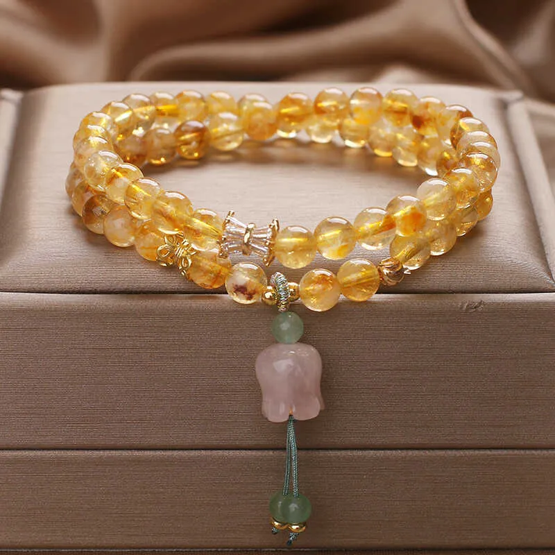 Women's crystal bracelet with natural gold rutilated quartz yellow tower double ring Lily pendant, pearl and rhinestone accents, 34cm length