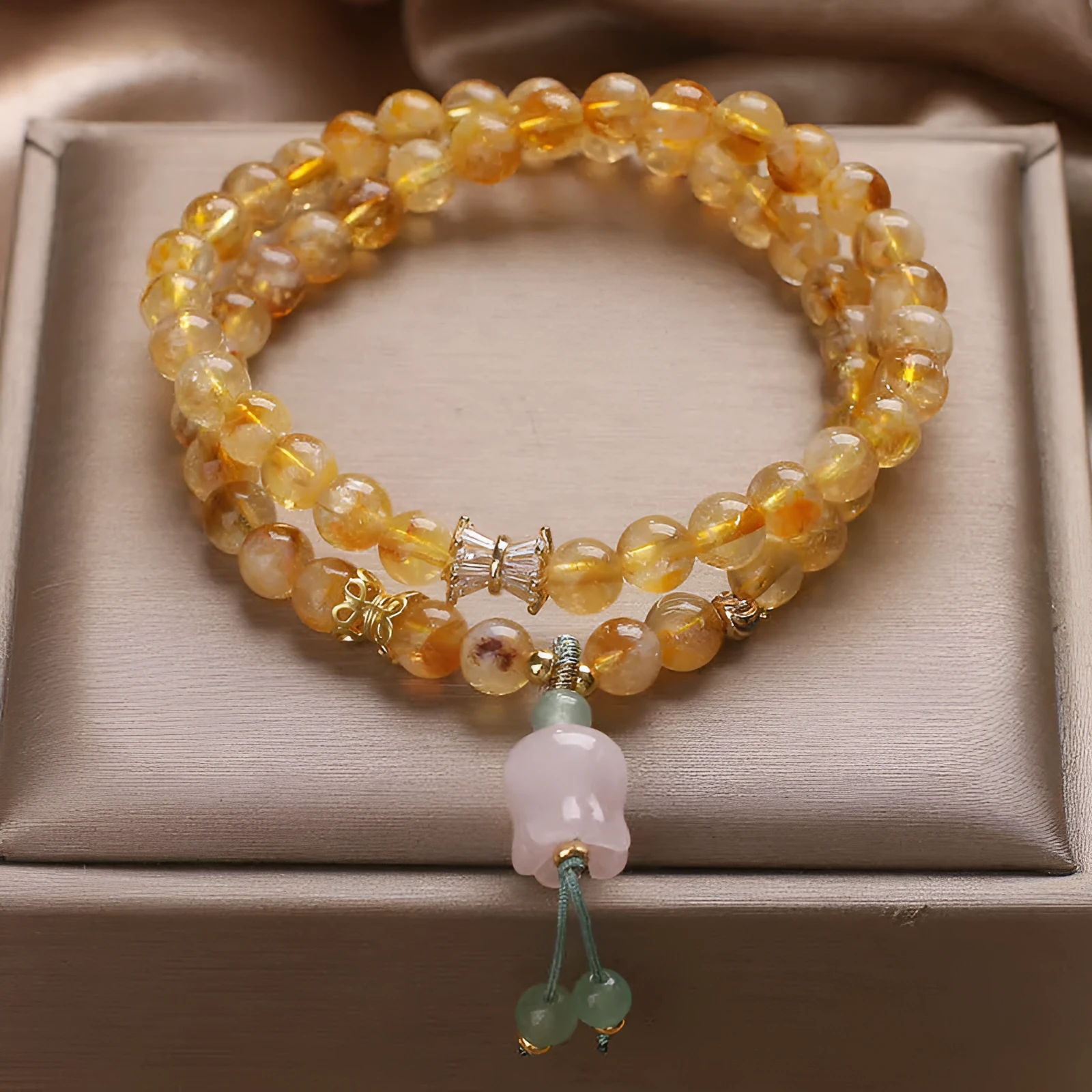 Women's crystal bracelet with natural gold rutilated quartz yellow tower double ring Lily pendant, pearl and rhinestone accents, 34cm length