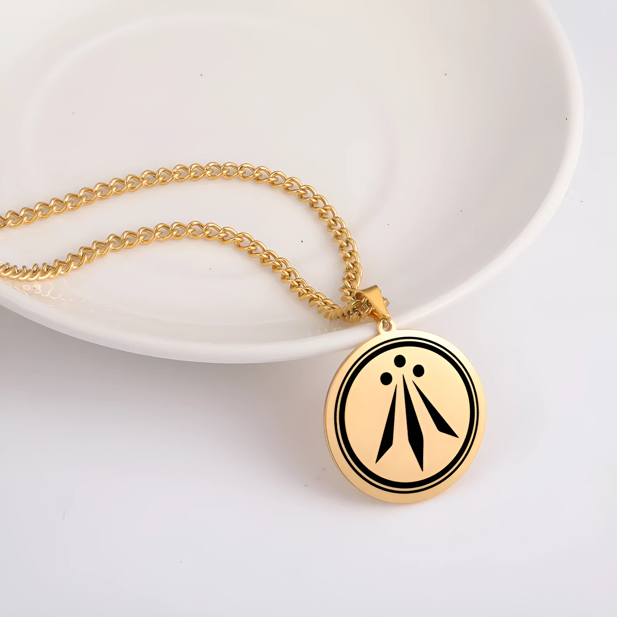 Irish Celtics geometric pendant necklace in stainless steel with gold finish on adjustable chain