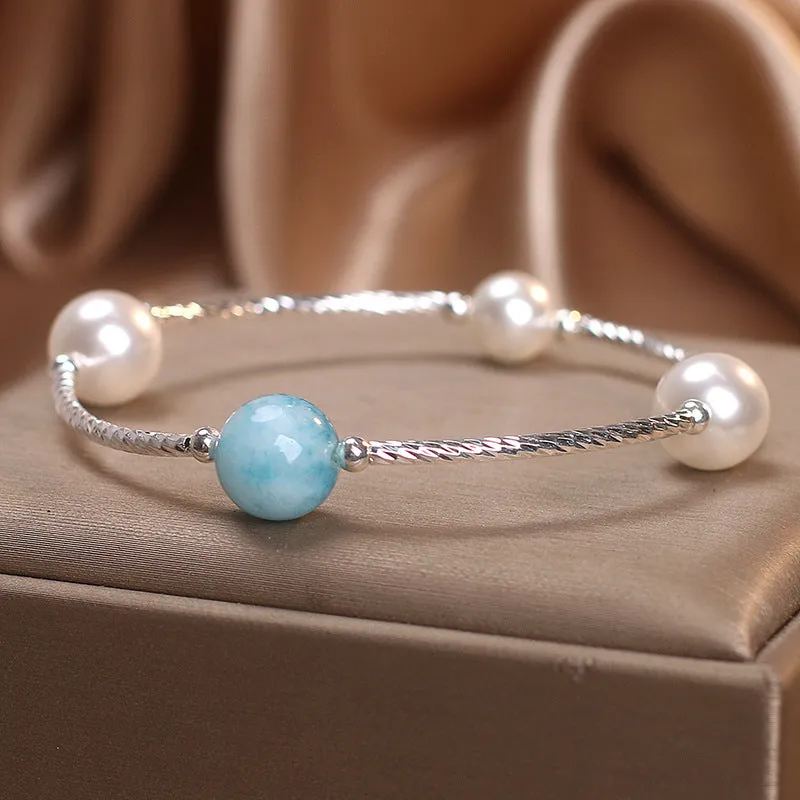Niche design agate bracelet with sea-pattern stone and cherry blossom beads in blue and pink for women