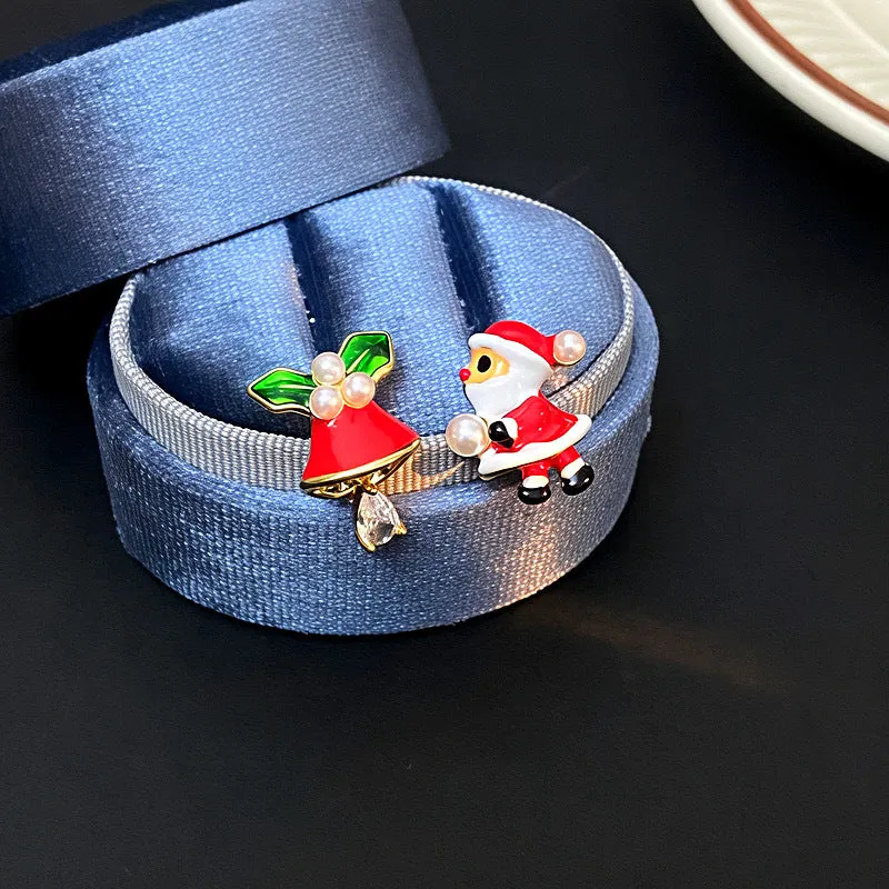 Pair of copper Christmas earrings with gold plating, cartoon Santa figure and jingling bell