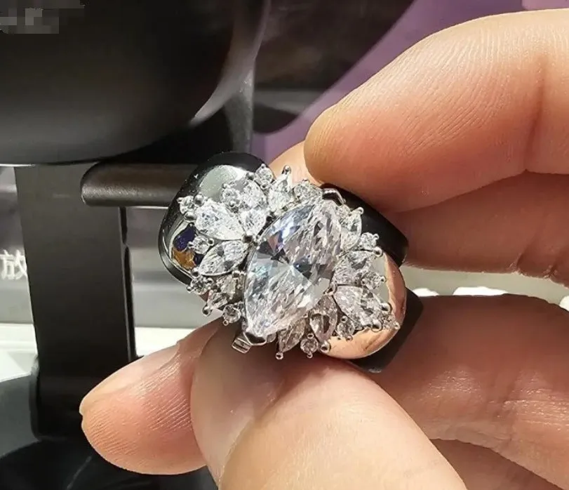Electroplated silver plate earphone clip with zircon accents for cable management in diamond rhombus shape