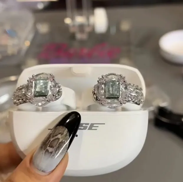 Electroplated silver plate earphone clip with zircon accents for cable management in diamond rhombus shape
