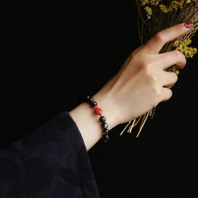 Natural obsidian crystal bracelet with round beads and cinnabar accents in three size options