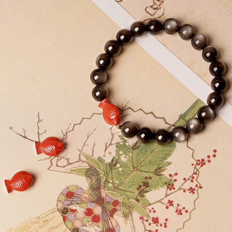 Natural obsidian crystal bracelet with round beads and cinnabar accents in three size options