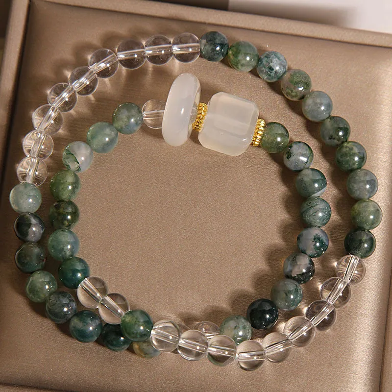 Double circle green grass agate and white agate cube sugar bracelet on a neutral background