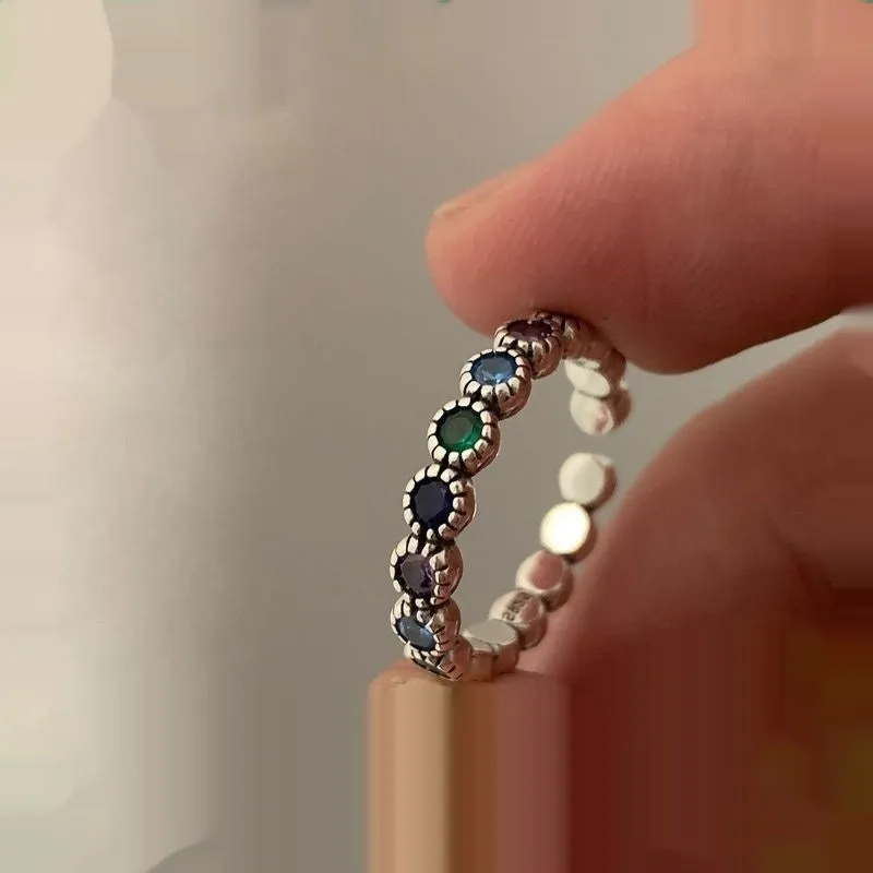 Adjustable opening women's ring with geometric round shape and zircon detailing in retro silver finish
