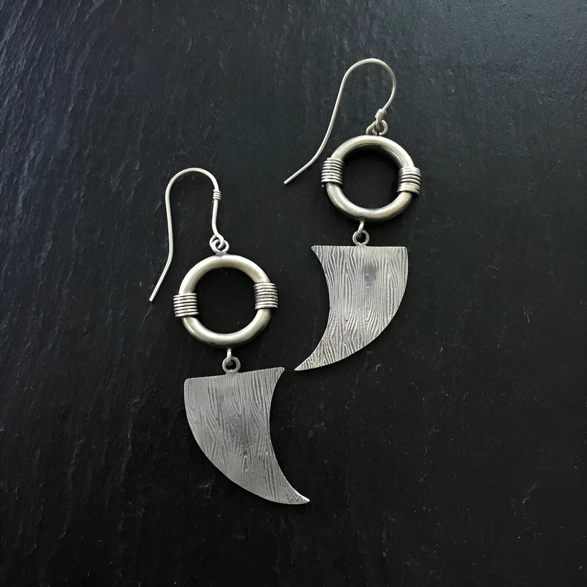 Retro women's earrings with antique silver snake design and electroplated finish on alloy.