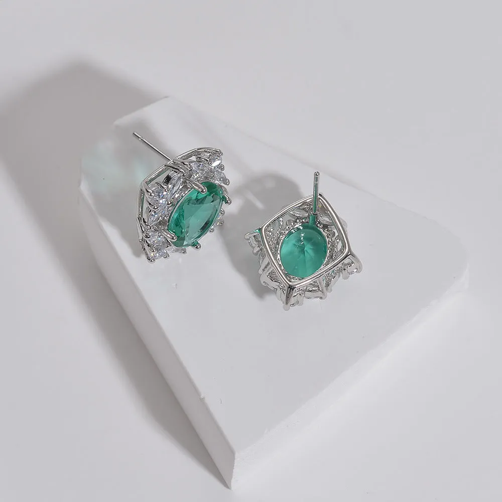 Retro copper oval clip-on earrings with green coloured gem and zircon inlay
