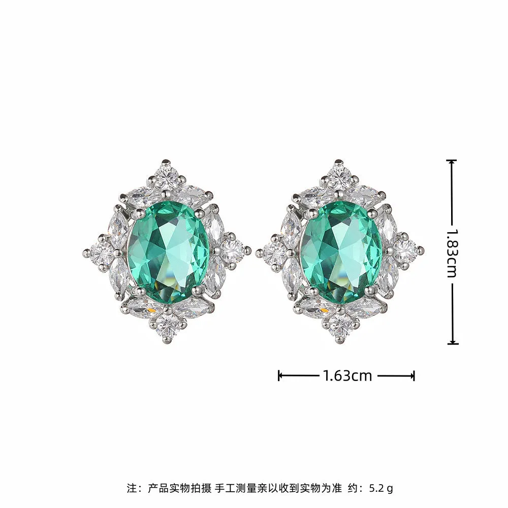 Retro copper oval clip-on earrings with green coloured gem and zircon inlay