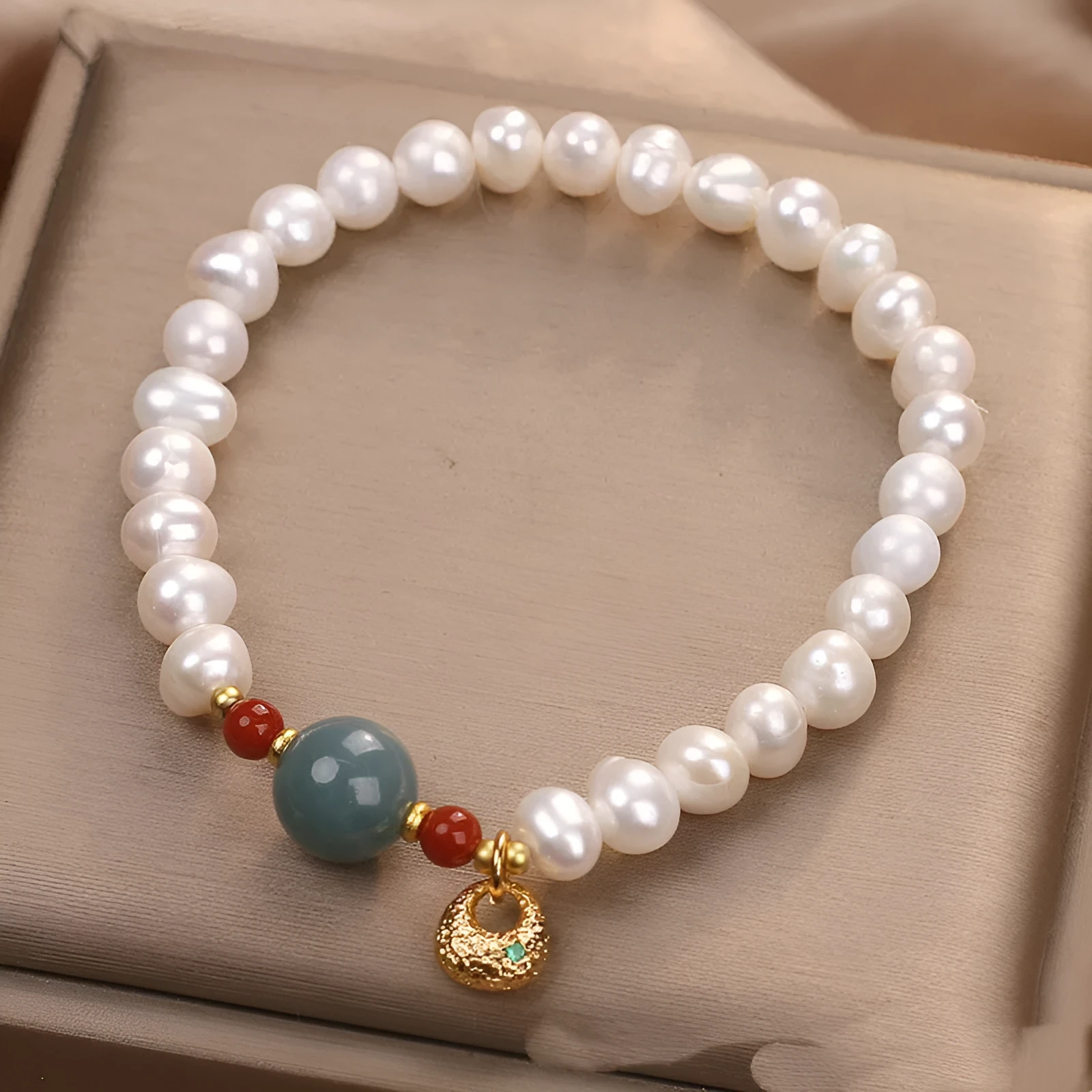 White freshwater pearl and aquamarine bracelet with opal centrepiece, ethnic style