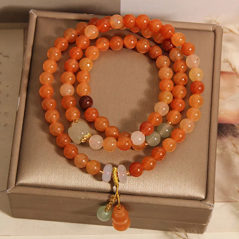 Artistic antique natural Jinsi Jade multi-layer bracelet with pumpkin beads and calabash pendant on white background
