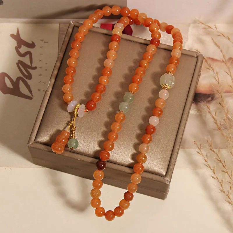 Artistic antique natural Jinsi Jade multi-layer bracelet with pumpkin beads and calabash pendant on white background