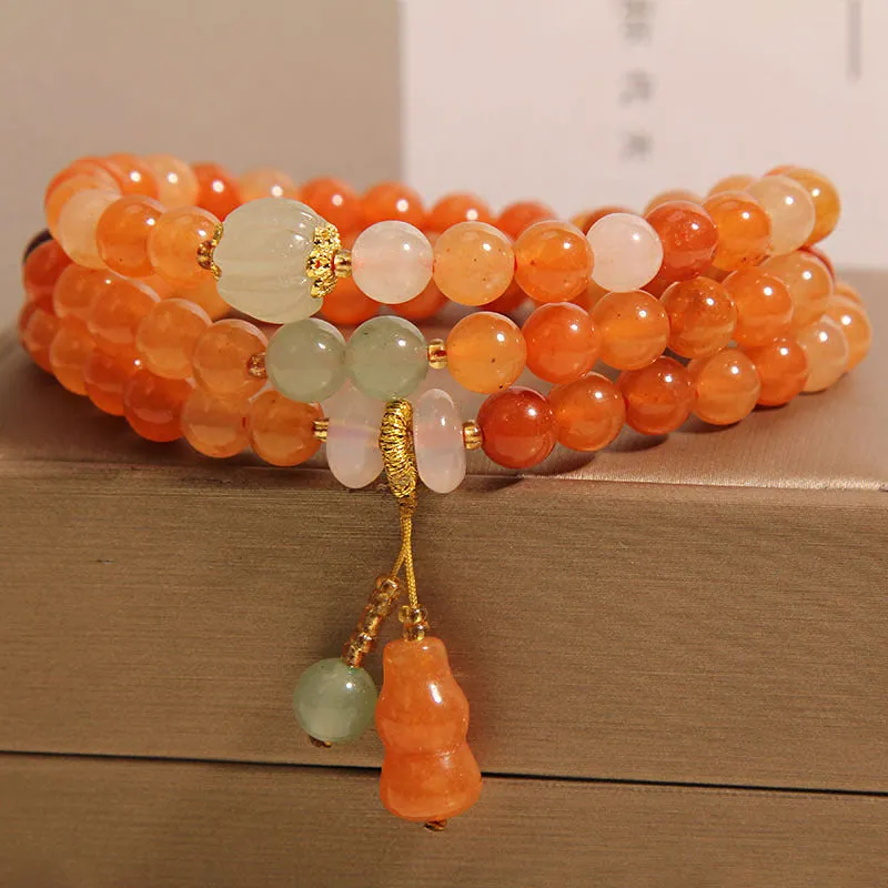 Artistic antique natural Jinsi Jade multi-layer bracelet with pumpkin beads and calabash pendant on white background