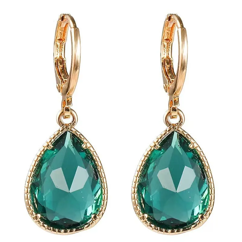 Hand-carved glass water drop earrings with geometric Saturn design in various colours