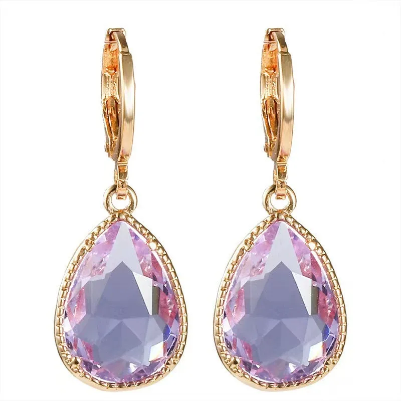 Hand-carved glass water drop earrings with geometric Saturn design in various colours