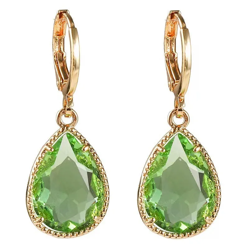 Hand-carved glass water drop earrings with geometric Saturn design in various colours
