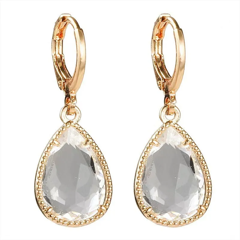 Hand-carved glass water drop earrings with geometric Saturn design in various colours